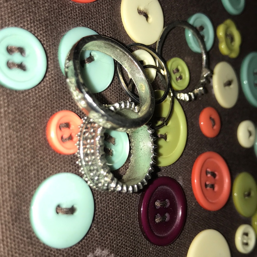“Hand in hand into the ocean” ring plus others set